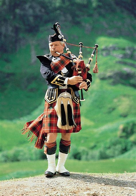 Scottish man playing bagpipes
